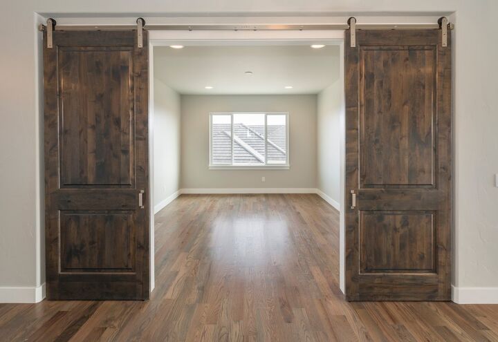 Hang A Barn Door From The Ceiling, How To Install A Hanging Sliding Door